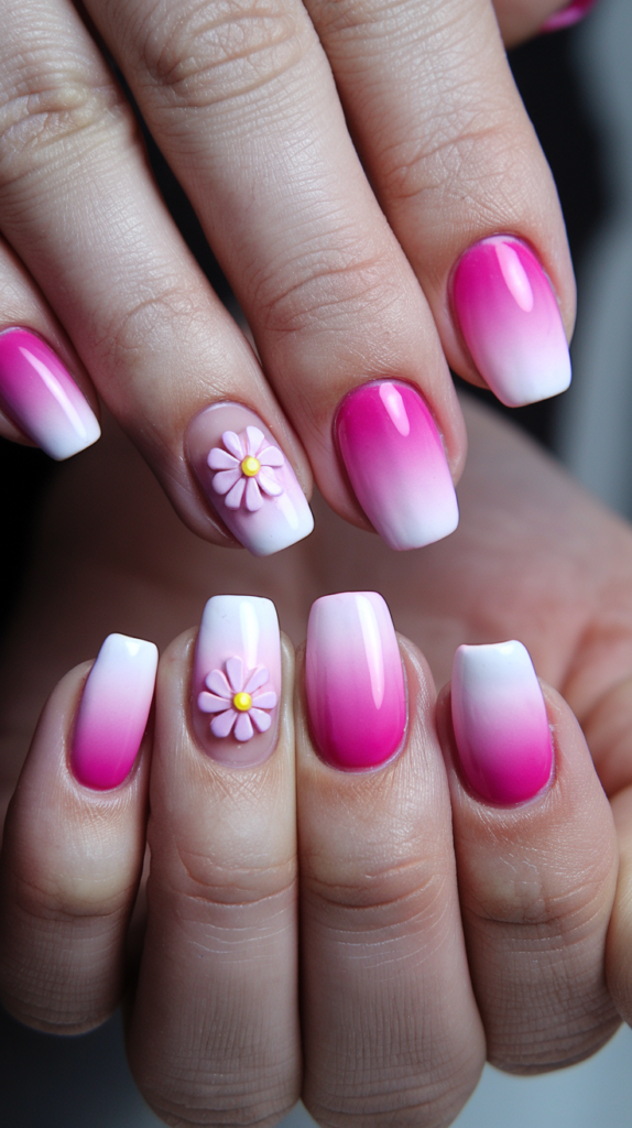 Stunning Pink Flower Nail Designs You’ll Love. Ombre pink nails featuring flower designs and embellishments.